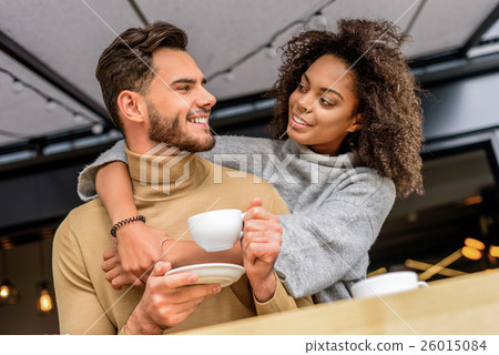 people in comfy wear hugging 26015084