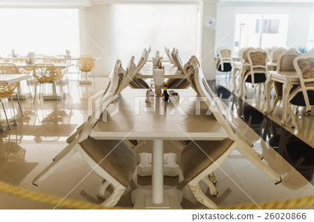 Table chairs for breakfast in hotel lobby Table chairs for breakfast in hotel lobby 26020866