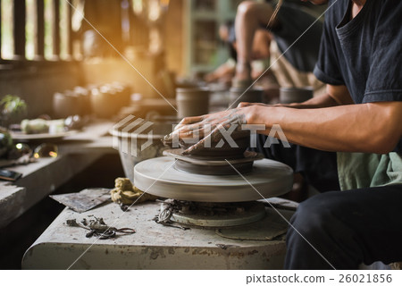potter's hands make an earthen pot potter's hands make an earthen pot 26021856