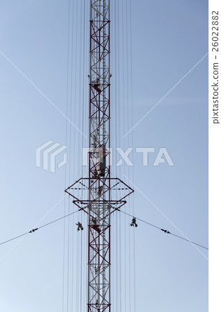 Men painting radio transmitter tower Liblice 26022882