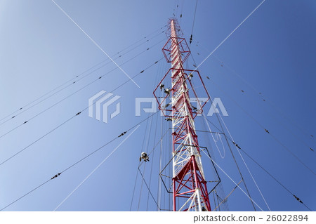 Men painting radio transmitter tower Liblice 26022894