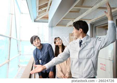 Newly built sales real estate couple guide balcony 26024726