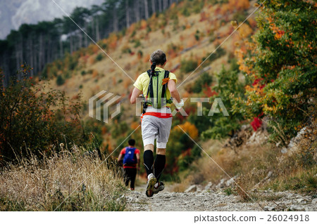 closeup male runner with walking stick nordic 26024918