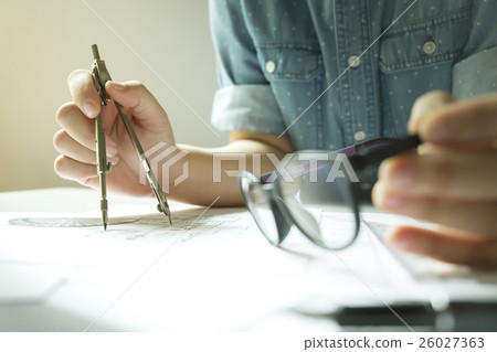 Mechanical engineer at work. Mechanical engineer at work. 26027363