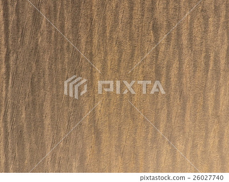 Top view of a plowed field 26027740