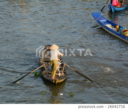 People with wooden boat on the river in Vietnam 26042738