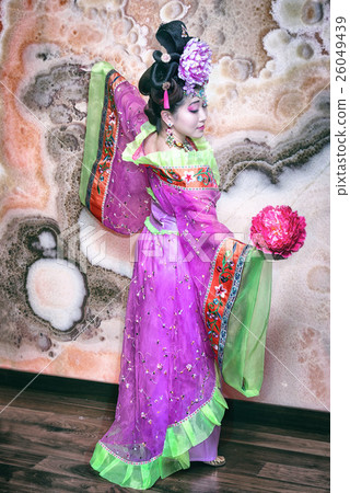 Asian style portrait of a woman with flower Asian style portrait of a woman with flower 26049439