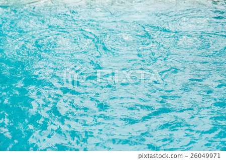 Blue swimming pool rippled water . Blue swimming pool rippled water . 26049971