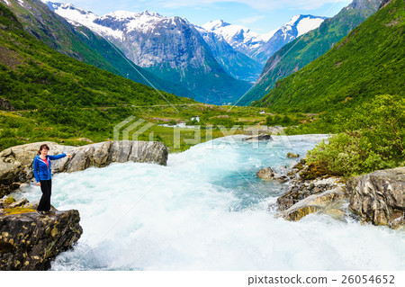 Tourist woman by Videfossen Waterfall in Norway Tourist woman by Videfossen Waterfall in Norway 26054652