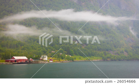 Norwegian country houses, mountains on lake shore 26054666