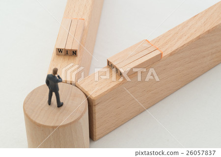 A businessman standing at a branch point 26057837