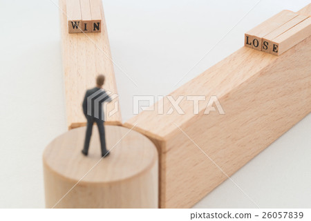 A businessman standing at a branch point 26057839