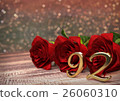 birthday concept with red roses on wooden desk 26060310