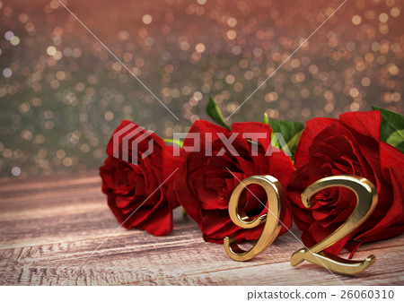 birthday concept with red roses on wooden desk 26060310