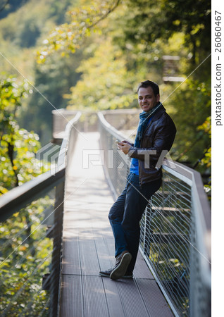 Caucasian man with cell phone making call in 26060467