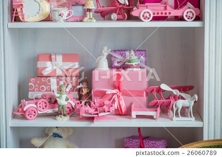 Christmas gifts in box on a shelf, pink car 26060789