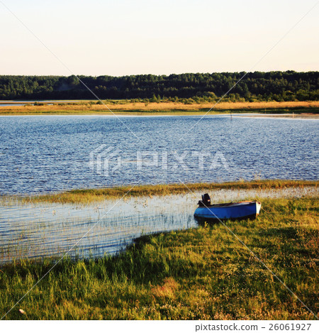 Fishing boat at the shore of Kenozero lake. Russia Fishing boat at the shore of Kenozero lake. Russia 26061927