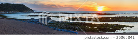 Sunset ocean view from beach. 26063841