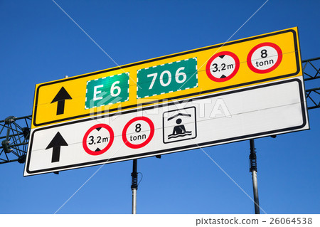 Colorful road signs with route numbers 26064538