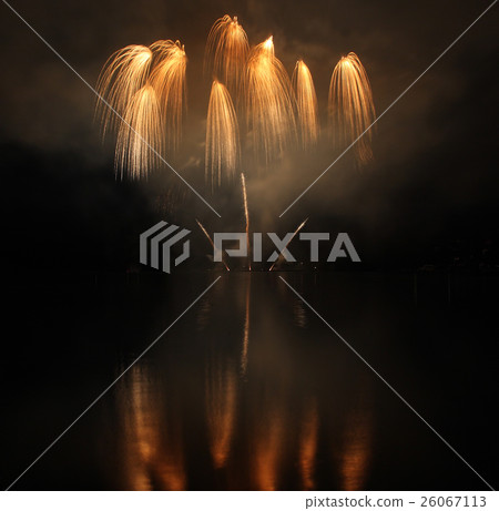Colorful fireworks with reflection on lake. 26067113