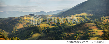 Sunny evening in mountains. Autumn village Sunny evening in mountains. Autumn village 26068510