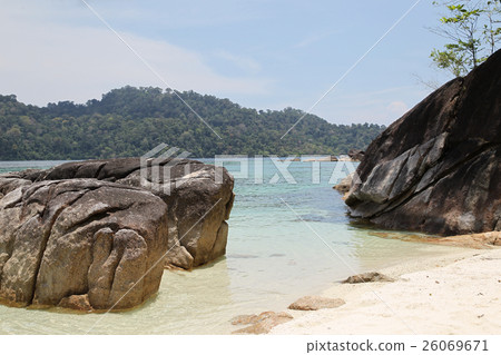Large boulders on the beach 26069671