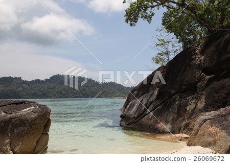 Large boulders on the beach 26069672