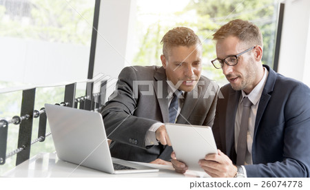Two Businessmen Cafe Meeting Wireless Tablet Concept Two Businessmen Cafe Meeting Wireless Tablet Concept 26074778