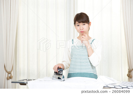 Housewife ironing iron 26084099