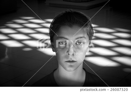 black and white portrait of a teenage boy 26087320