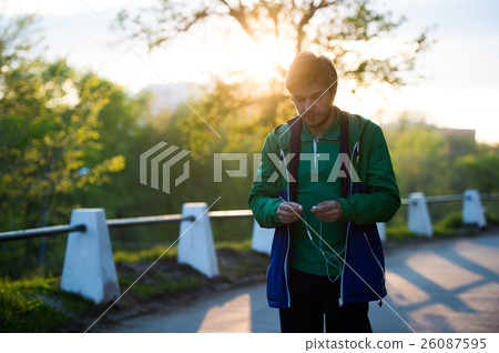 Toned Photo of Common young lonely man walking in Toned Photo of Common young lonely man walking in 26087595