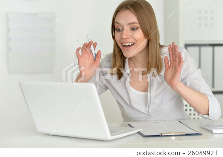 Young attractive  businesswoman with laptop 26089921