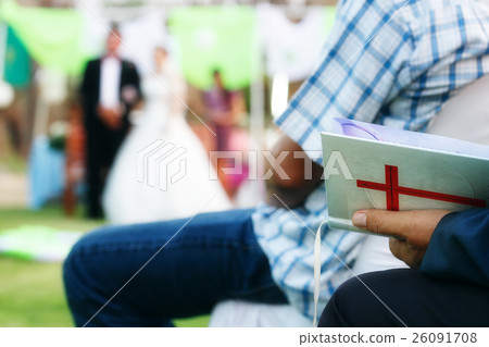 Christian wedding. With bible in hand 26091708