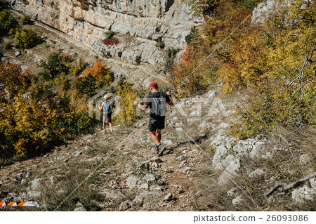 couple hikers with walking poles couple hikers with walking poles 26093086