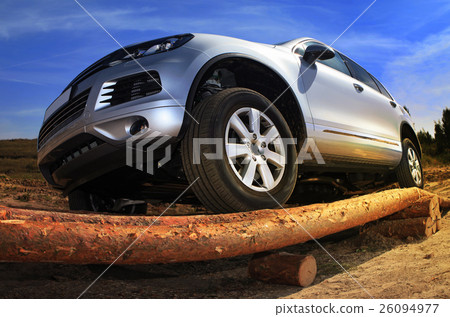 SUV overcomes obstacle SUV overcomes obstacle 26094977