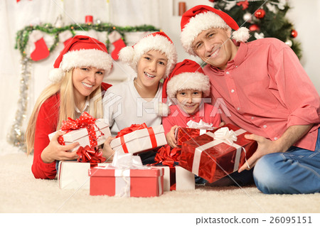 Family celebrating New Year Family celebrating New Year 26095151