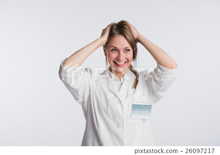 Funny female nurse or doctor standing with hands Funny female nurse or doctor standing with hands 26097217