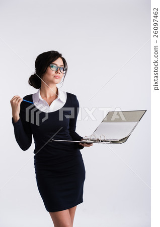 Young Caucasian woman wearing dark blue dress Young Caucasian woman wearing dark blue dress 26097462