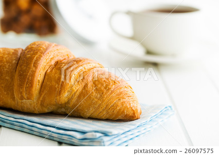 Tasty buttery croissant. Tasty buttery croissant. 26097575