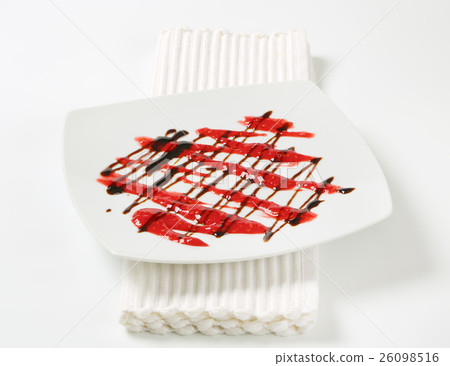 Dessert drizzle sauces on plate 26098516