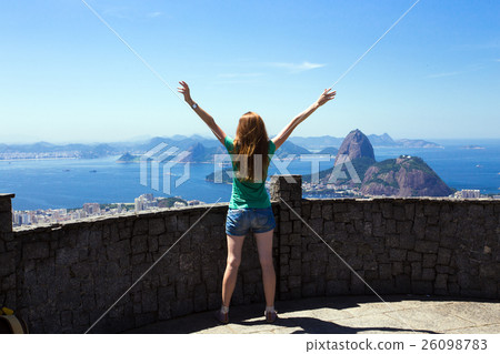 girl tourist looks at Rio landscape 26098783
