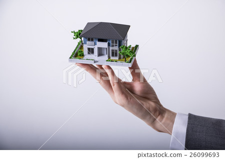 Housing model supported by hand Housing model supported by hand 26099693