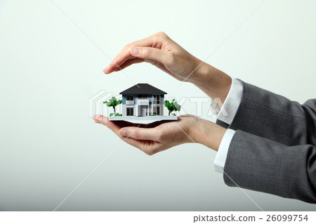 Japanese lady who protects housing model by hand 26099754
