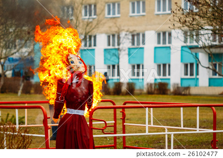 Scarecrow in flames during combustion 26102477