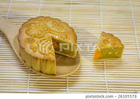 Mid-Autumn Festival moon cake in spoon on wooden Mid-Autumn Festival moon cake in spoon on wooden 26105578