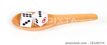 Two dices in wood spoon on white background Two dices in wood spoon on white background 26106574