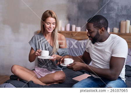 Cute Couple Having Breakfast In Bedroom Together Stock