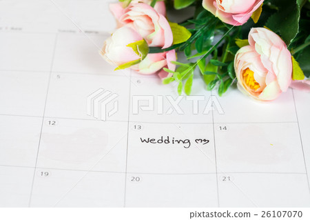 word wedding on calendar with sweet flowers 26107070
