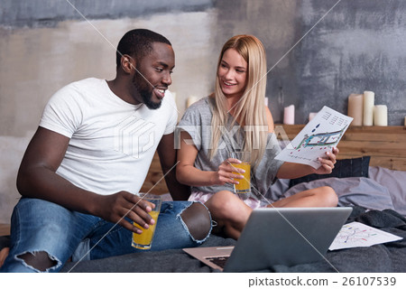 Lovely couple drinking juice together 26107539