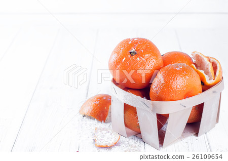 new year composition in basket with mandarins 26109654